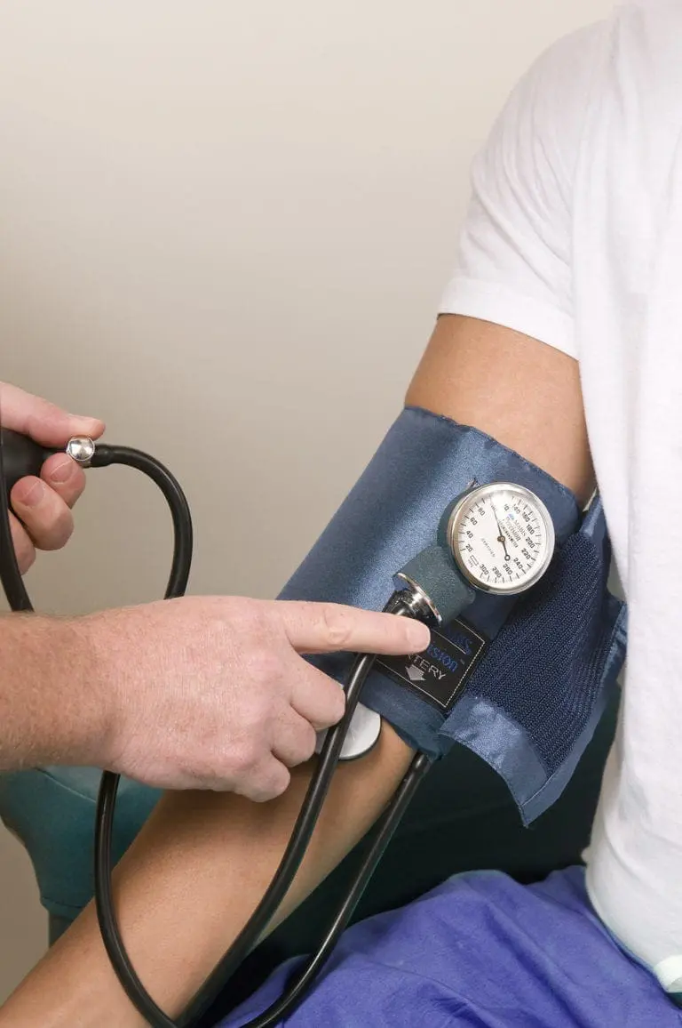 patient getting blood pressure taken