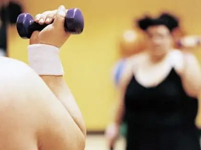 overweight person exercising