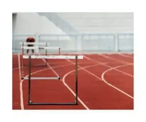 track with hurdles and a racer getting ready