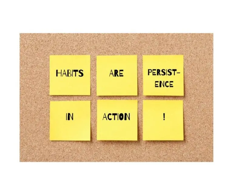 bulletin board with yellow sticky notes