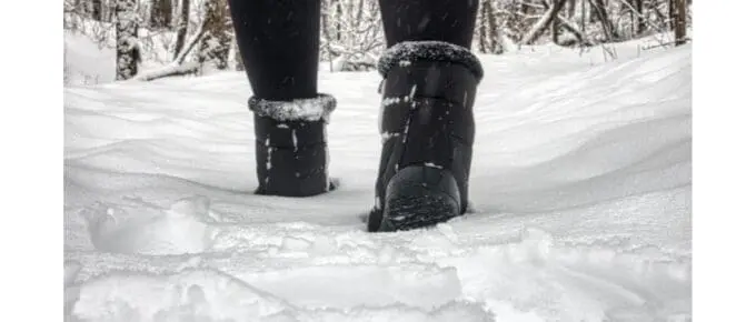 black boots in the snow