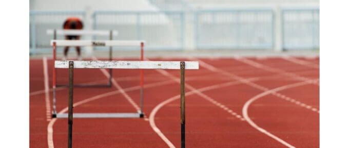 track with hurdles and a racer getting ready