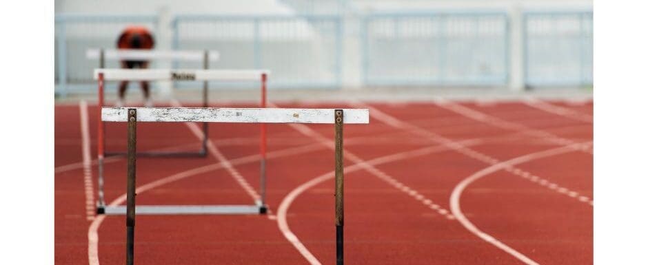 track with hurdles and a racer getting ready